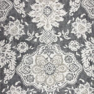 Intricate white floral patterns on a gray textured background.