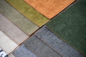 Close-up of textured fabric swatches in various colors arranged diagonally.